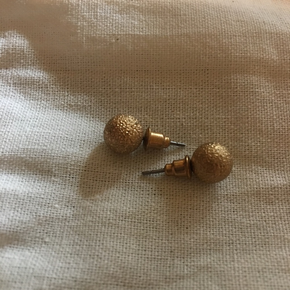 Gold colored earrings